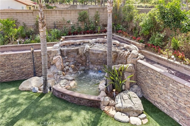 1202 Duke Ln, Walnut, CA 91789 - fenced backyard featuring a garden pond