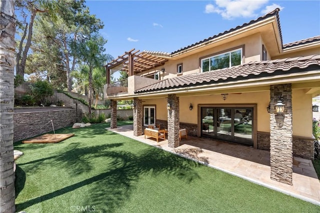 1202 Duke Ln, Walnut, CA 91789 - back of house featuring french doors, stone siding, stucco siding, a balcony, and a tile roof