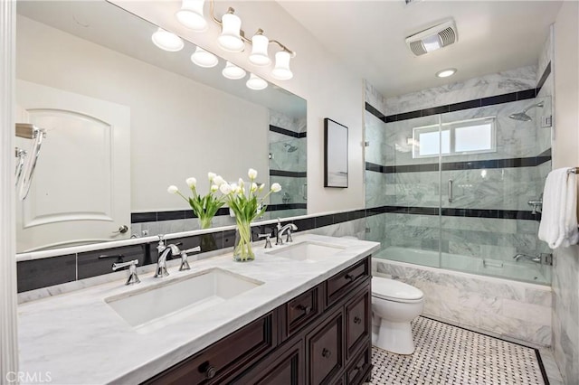 1202 Duke Ln, Walnut, CA 91789 - full bath featuring shower / bath combination with glass door, toilet, and double vanity