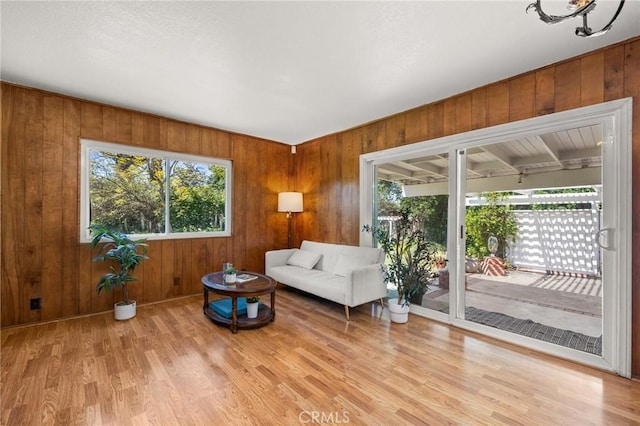 1424 E Vine Ave, West Covina, CA 91791 - living room with wood finished floors and wooden walls