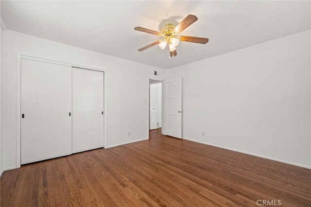 1424 E Vine Ave, West Covina, CA 91791 - unfurnished bedroom featuring wood finished floors, baseboards, a closet, and ceiling fan