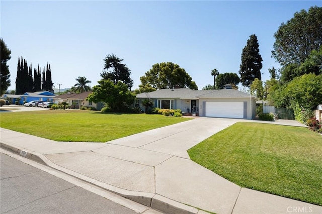 1424 E Vine Ave, West Covina, CA 91791 - ranch-style home with an attached garage, a front yard, and driveway