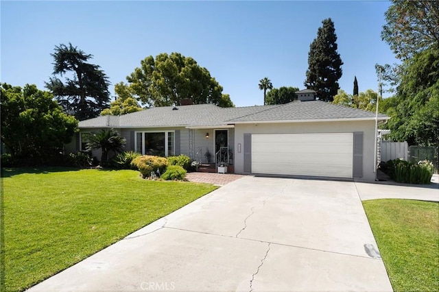 1424 E Vine Ave, West Covina, CA 91791 - ranch-style home with an attached garage, concrete driveway, and stucco siding