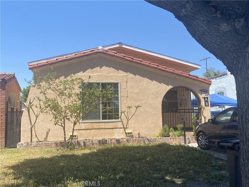 2927 Missouri Ave, South Gate, CA 90280 - view of home's exterior featuring stucco siding