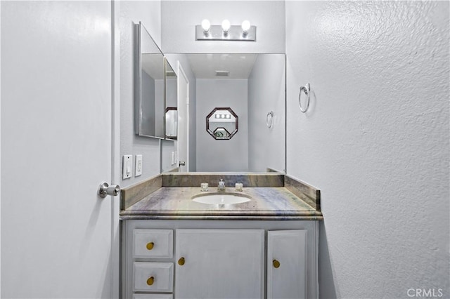 9158 Van Nuys Blvd Unit 8, Panorama City, CA 91402 - bathroom with a textured wall and vanity