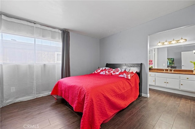 9158 Van Nuys Blvd Unit 8, Panorama City, CA 91402 - bedroom featuring dark wood-style floors and ensuite bath