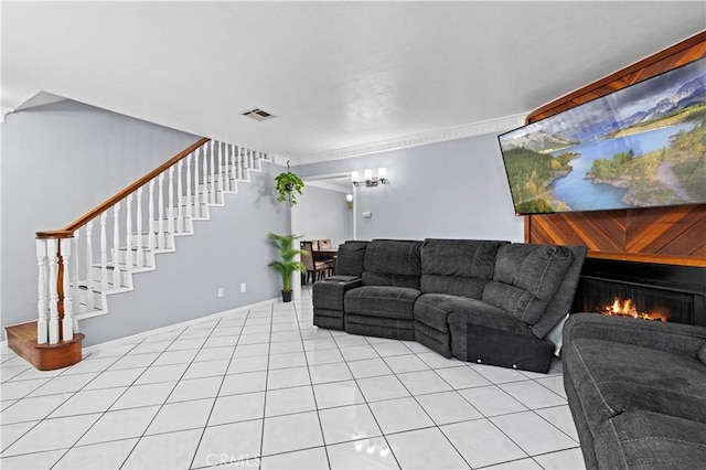 9158 Van Nuys Blvd Unit 8, Panorama City, CA 91402 - living area with stairway, a warm lit fireplace, and light tile patterned floors