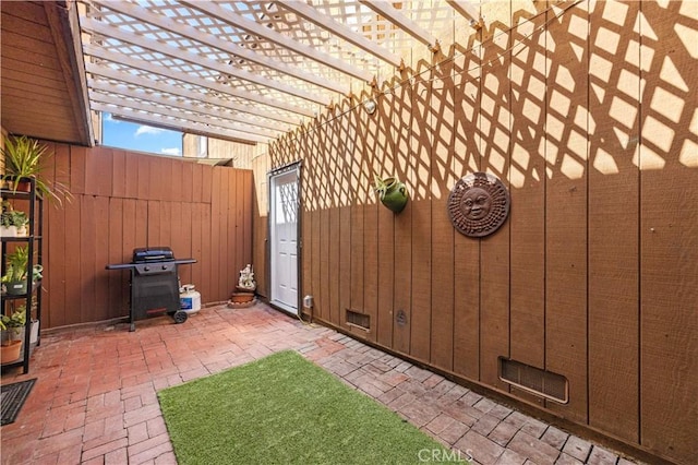 9158 Van Nuys Blvd Unit 8, Panorama City, CA 91402 - view of patio featuring a grill and a pergola