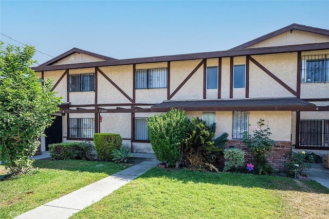 11408 Herb St Unit 7, South El Monte, CA 91733 - view of front of house featuring a front lawn and stucco siding