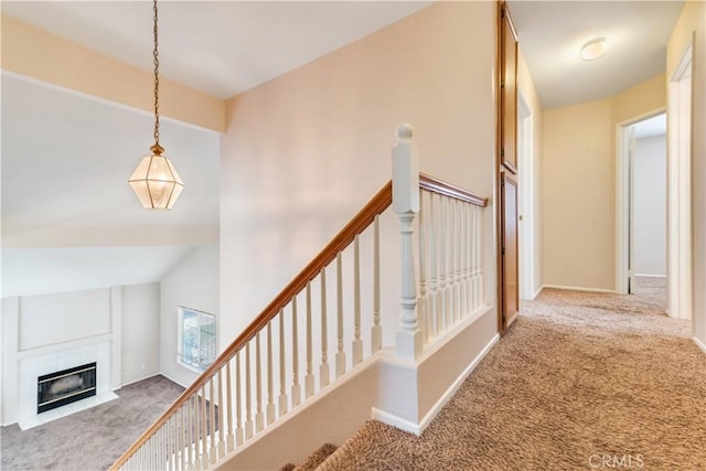 26057 Crestmont Cir, Menifee, CA 92586 - stairway featuring carpet floors and a fireplace