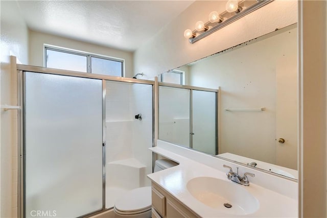 26057 Crestmont Cir, Menifee, CA 92586 - bathroom with vanity, a shower stall, and toilet