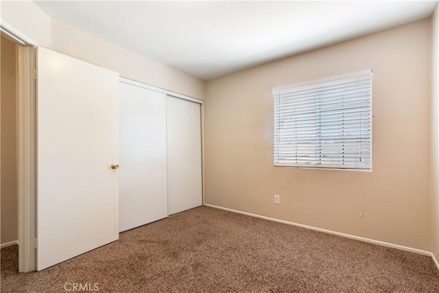 26057 Crestmont Cir, Menifee, CA 92586 - unfurnished bedroom featuring carpet, a closet, and baseboards