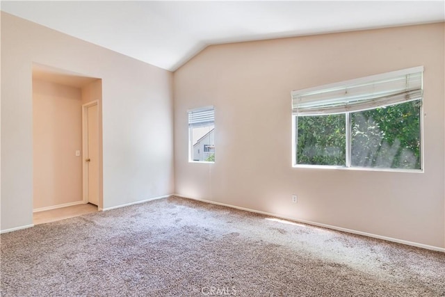 26057 Crestmont Cir, Menifee, CA 92586 - carpeted spare room with healthy amount of natural light, vaulted ceiling, and baseboards