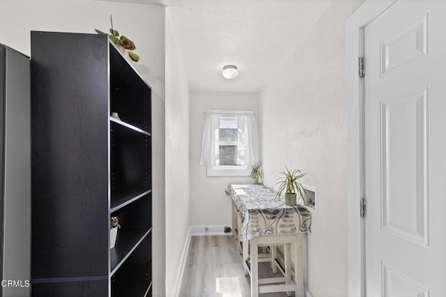 618 S C St, Oxnard, CA 93030 - doorway to outside featuring wood finished floors and baseboards