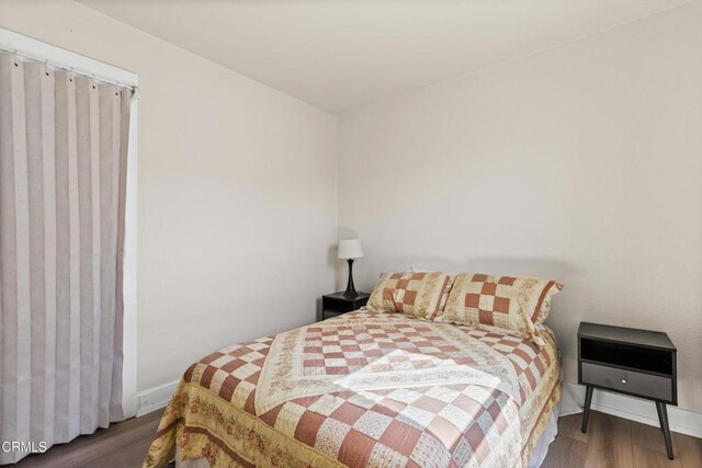 618 S C St, Oxnard, CA 93030 - bedroom with wood finished floors and baseboards