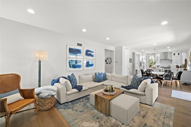 18976 Rockinghorse Ln, Huntington Beach, CA 92648 - living area featuring recessed lighting and wood finished floors