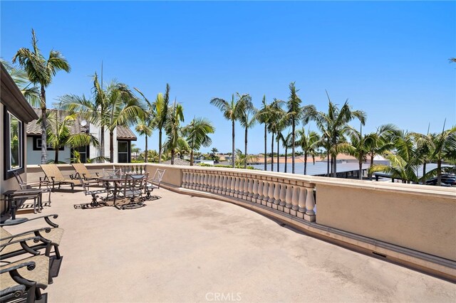 18976 Rockinghorse Ln, Huntington Beach, CA 92648 - view of patio / terrace with a water view