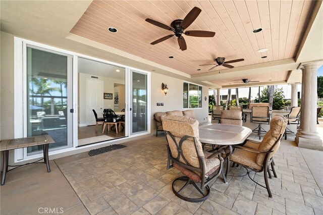 18976 Rockinghorse Ln, Huntington Beach, CA 92648 - view of patio / terrace featuring outdoor dining space and a ceiling fan