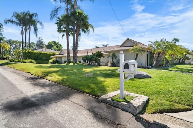 21166 E Rimpath Dr, Covina, CA 91724 - ranch-style house with a front yard and stucco siding