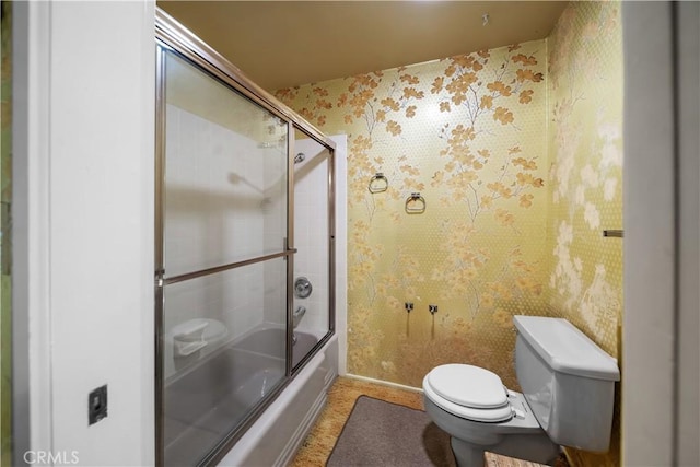 21166 E Rimpath Dr, Covina, CA 91724 - bathroom featuring wallpapered walls, toilet, enclosed tub / shower combo, and baseboards
