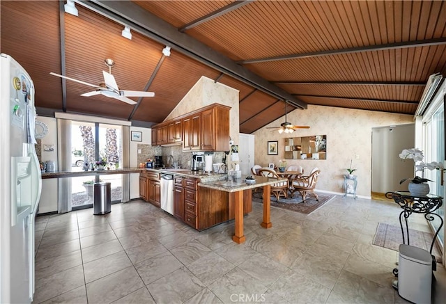 21166 E Rimpath Dr, Covina, CA 91724 - kitchen with a ceiling fan, white refrigerator with ice dispenser, dishwasher, brown cabinetry, and wood ceiling