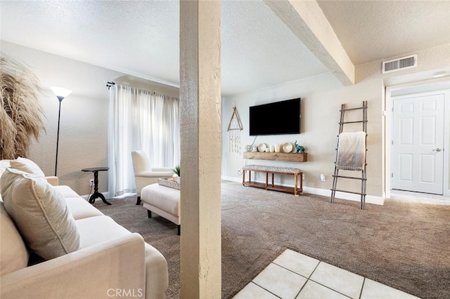 2881 Huntington Blvd Unit 137, Fresno, CA 93721 - living area with carpet flooring, a textured ceiling, beamed ceiling, and baseboards