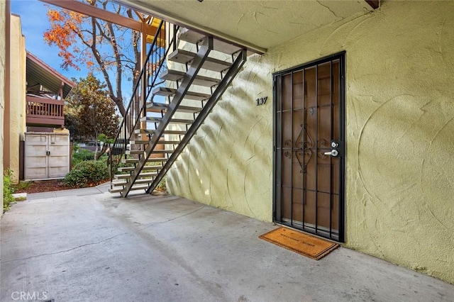 2881 Huntington Blvd Unit 137, Fresno, CA 93721 - doorway to property featuring a patio and stucco siding