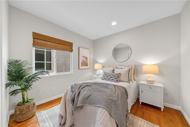1518 Ocean Ave, Seal Beach, CA 90740 - bedroom featuring baseboards, wood finished floors, and recessed lighting