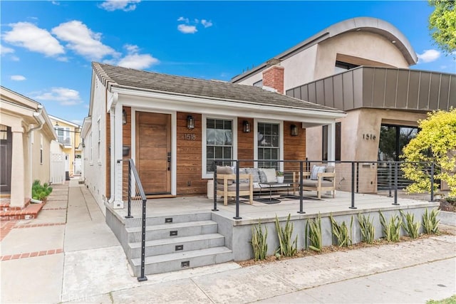 1518 Ocean Ave, Seal Beach, CA 90740 - view of front of house featuring a chimney and a porch