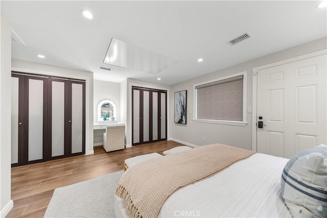 1518 Ocean Ave, Seal Beach, CA 90740 - bedroom with wood finished floors, recessed lighting, and baseboards