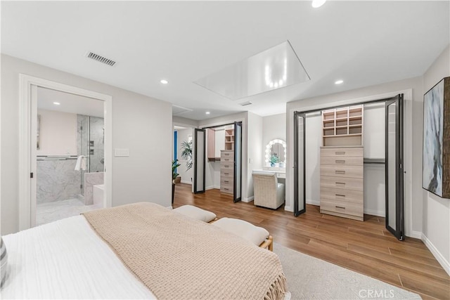 1518 Ocean Ave, Seal Beach, CA 90740 - bedroom featuring attic access, wood finished floors, recessed lighting, baseboards, and ensuite bathroom