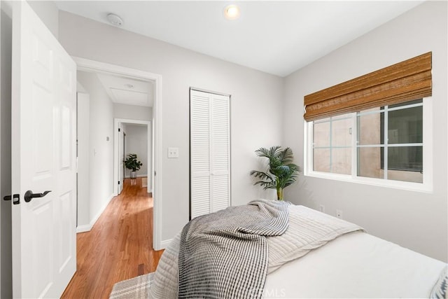 1518 Ocean Ave, Seal Beach, CA 90740 - bedroom with light wood-style floors, baseboards, a closet, and recessed lighting