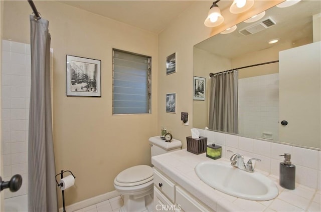 4252 Fair Ave Unit 2, North Hollywood, CA 91602 - full bathroom with toilet, curtained shower, tile patterned flooring, and vanity