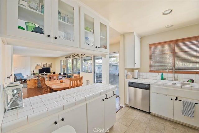 4252 Fair Ave Unit 2, North Hollywood, CA 91602 - kitchen featuring dishwasher, a sink, tile counters, white cabinetry, and recessed lighting