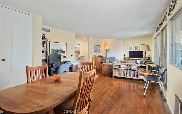 4252 Fair Ave Unit 2, North Hollywood, CA 91602 - dining space featuring wood finished floors, an office area, and a textured ceiling
