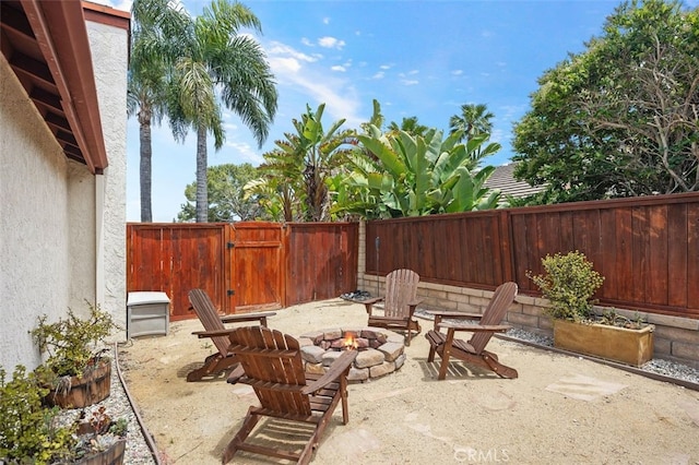 2818 Via Blanco, San Clemente, CA 92673 - fenced backyard with an outdoor fire pit and a patio area
