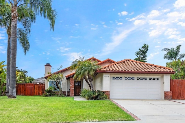2818 Via Blanco, San Clemente, CA 92673 - mediterranean / spanish house with an attached garage, stucco siding, brick siding, and concrete driveway