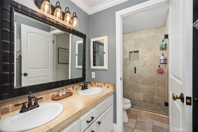 2818 Via Blanco, San Clemente, CA 92673 - bathroom featuring ornamental molding, a stall shower, toilet, and double vanity