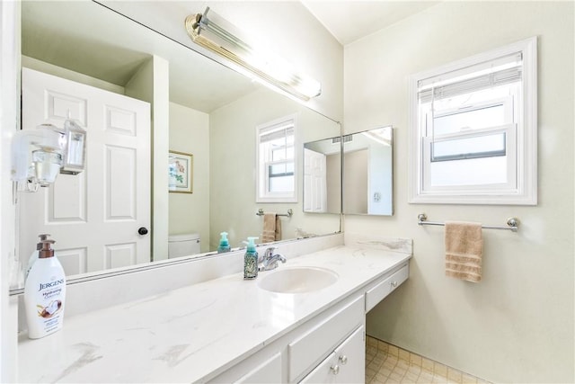 11628 Cedarvale St, Norwalk, CA 90650 - bathroom featuring vanity, toilet, and tile patterned floors