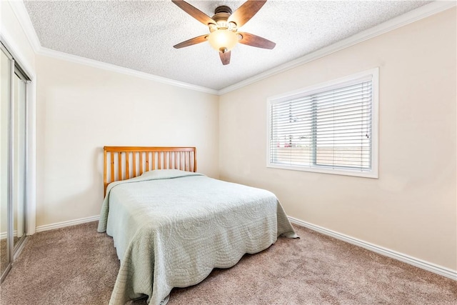 11628 Cedarvale St, Norwalk, CA 90650 - bedroom with carpet floors, a textured ceiling, a closet, baseboards, and ornamental molding