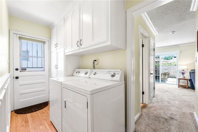 11628 Cedarvale St, Norwalk, CA 90650 - laundry area with cabinet space, washing machine and dryer, ornamental molding, light colored carpet, and a textured ceiling