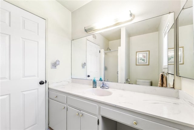 11628 Cedarvale St, Norwalk, CA 90650 - bathroom with vanity, a shower stall, and toilet