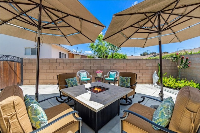 11628 Cedarvale St, Norwalk, CA 90650 - view of patio / terrace with an outdoor living space with a fire pit