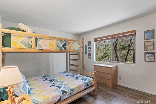 42646 Constellation Dr, Big Bear Lake, CA 92315 - bedroom featuring wood finished floors and baseboards