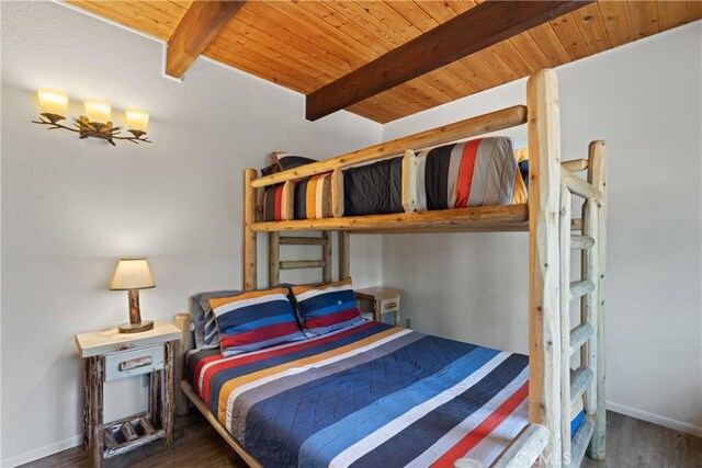 42646 Constellation Dr, Big Bear Lake, CA 92315 - bedroom with wood ceiling with exposed beams, wood finished floors, and baseboards
