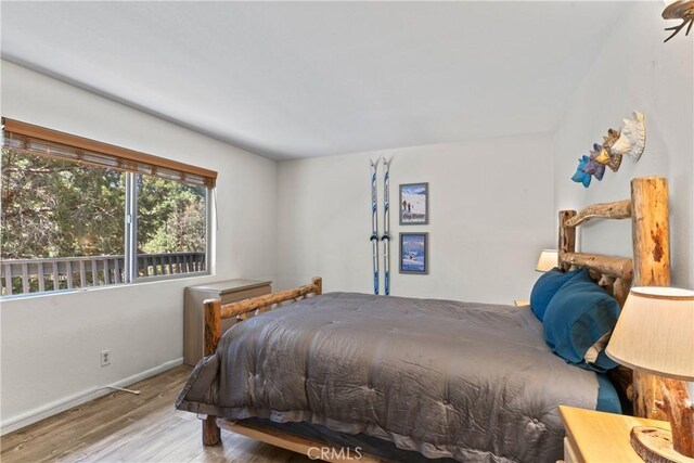 42646 Constellation Dr, Big Bear Lake, CA 92315 - bedroom featuring wood finished floors and baseboards