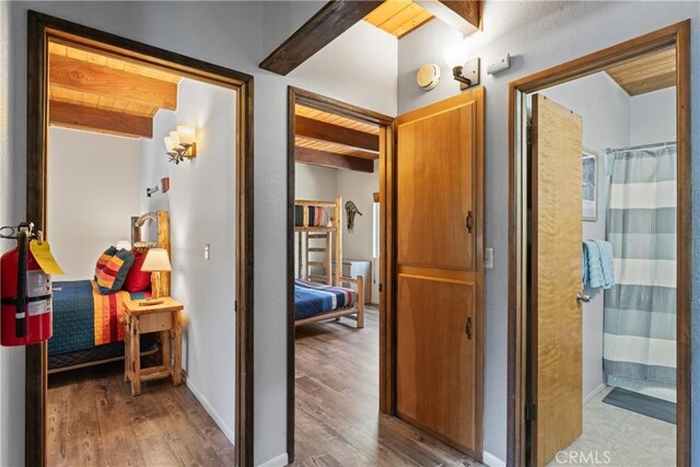 42646 Constellation Dr, Big Bear Lake, CA 92315 - hall with wood finished floors and wood ceiling with exposed beams