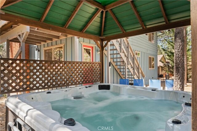 42646 Constellation Dr, Big Bear Lake, CA 92315 - view of patio / terrace featuring a hot tub and stairway