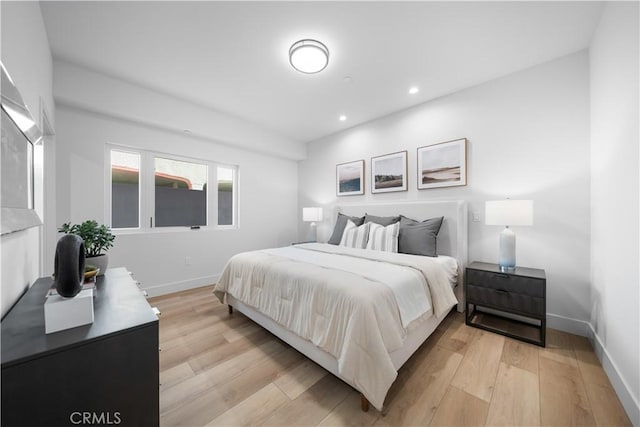 150 S Oak Knoll Ave Unit 103, Pasadena, CA 91101 - bedroom with light wood-style flooring, baseboards, and recessed lighting