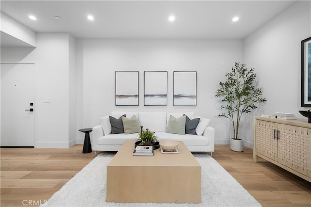 150 S Oak Knoll Ave Unit 103, Pasadena, CA 91101 - living room featuring light wood-style flooring, baseboards, and recessed lighting